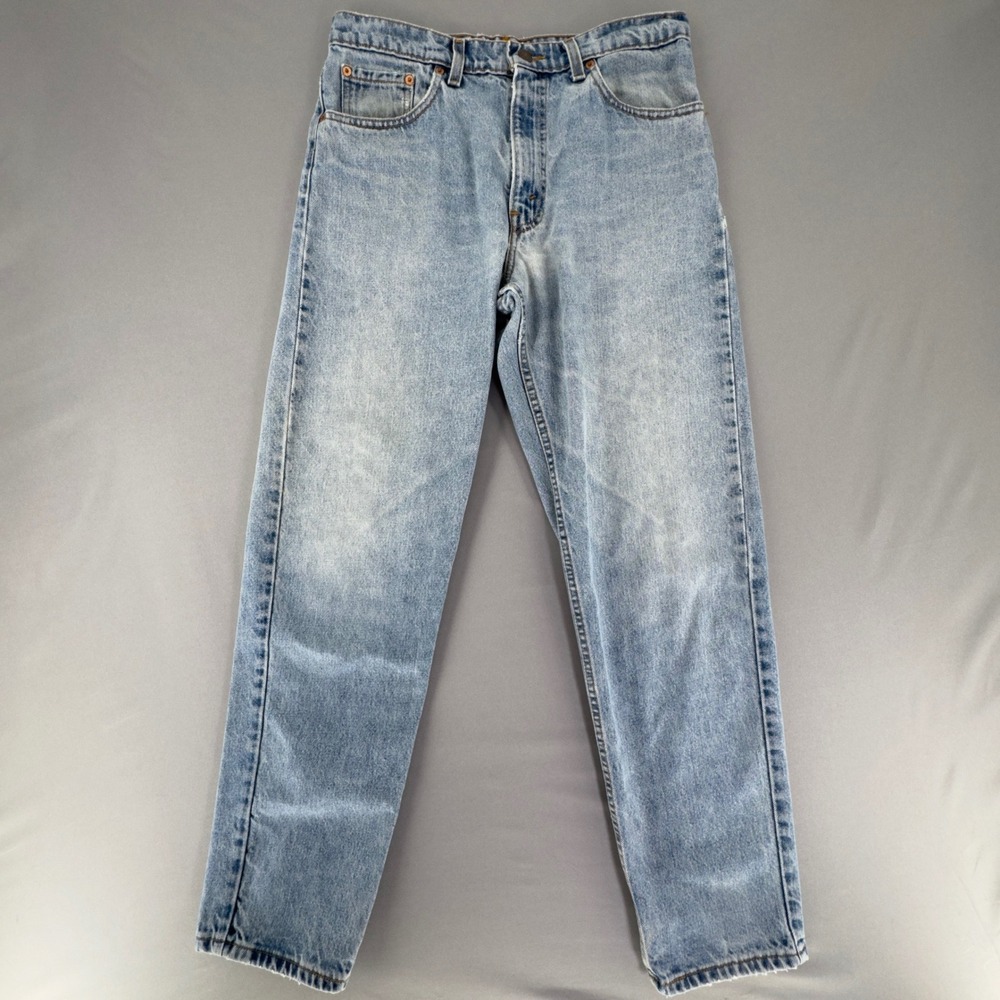 Levis 550 Relaxed Fit Tapered Leg Jeans Light Wash Blue 33x32 Vintage USA Made